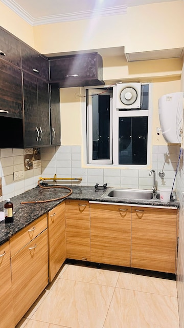 Kitchen in 2.5 BHK Apartment at Eldeco Residency Greens, Pi Greater Noida – for Sale