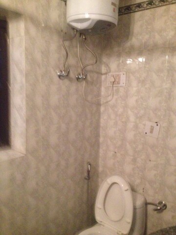 Bathroom in 2 BHK Builder Floor at Green Park Extension – for Rent