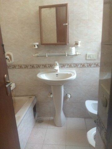 Bathroom in 4 BHK Builder Floor at New Friends Colony – for Rent