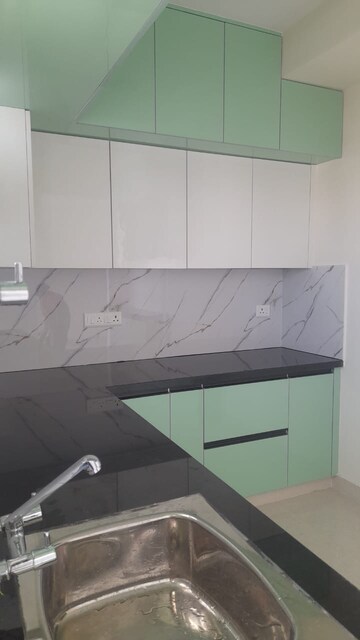 Kitchen in 2 BHK Apartment at Amrutha Heights Phase II, Whitefield – for Rent
