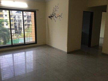 Room in 2 BHK Apartment at Seawoods – for Sale