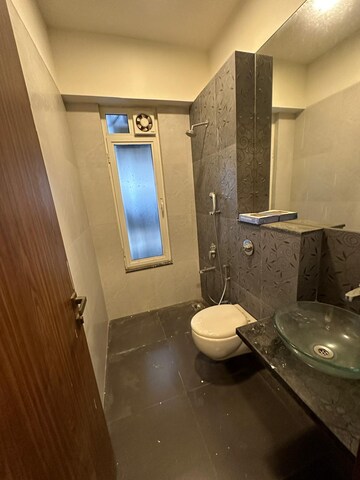 Bathroom in 3 BHK Apartment at Omkar Alta Monte, Malad East – for Rent