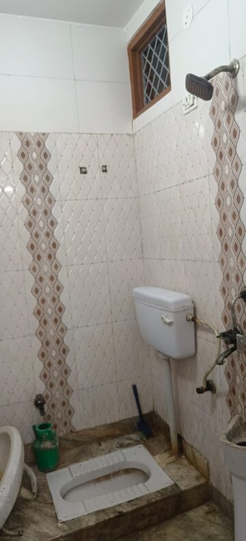 Bathroom in 2 BHK Apartment at Shaheen Bagh – for Sale