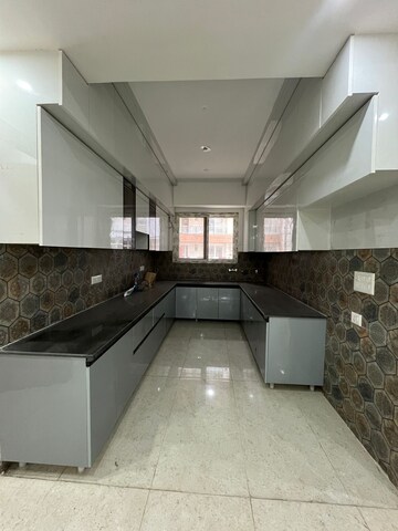 Kitchen in 4 BHK Apartment at Dwarika Raj Garden City, Raj Nagar Extension – for Sale