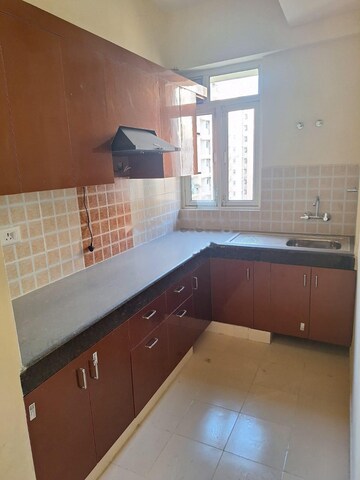 Kitchen in 2.5 BHK Apartment at ROF Aalayas, Sector 102 – for Rent