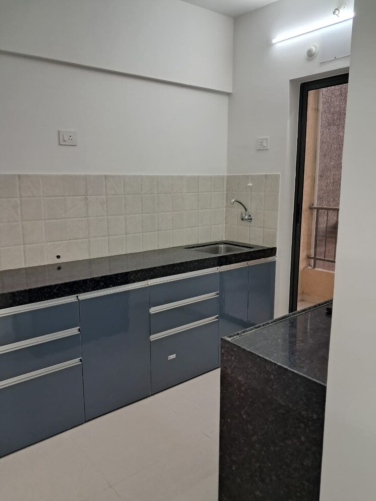 Kitchen, shapoorji-pallonji-joyville-hadapsar-annexe 2 Bedroom 726 Sq.Ft. Apartment In Hadapsar Pune 8289861