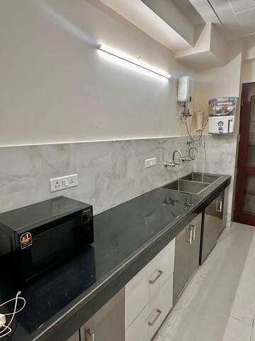 Kitchen in 3 BHK Builder Floor at Ansal Sushant Lok I, Sector 43 – for Rent