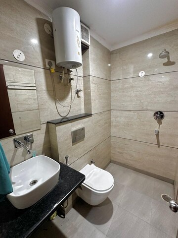 Bathroom in 3 BHK Builder Floor at Ansal Sushant Lok I, Sector 43 – for Rent