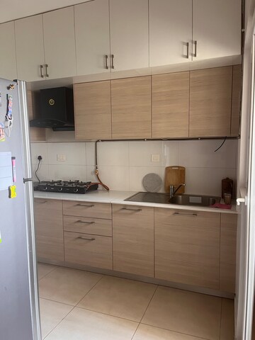 Kitchen in 2.5 BHK Apartment at Bhartiya Nikoo Homes Phase 2, Thanisandra Main Road – for Rent