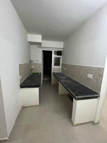 Kitchen in 2.5 BHK Apartment at Signature The Millennia 2, Sector 37d – for Rent