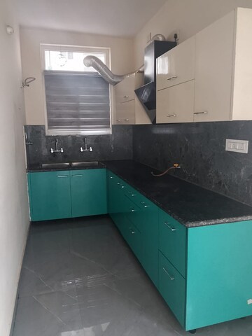 Kitchen in 3 BHK Builder Floor at Dhakoli Village – for Sale