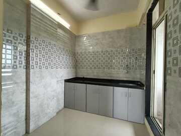 Kitchen in 1 BHK Apartment at Seawoods – for Sale