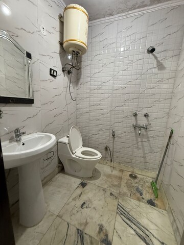 Bathroom in 2 BHK Apartment at Chattarpur – for Rent
