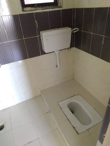 Bathroom in 2 BHK Apartment at Kala Nagar – for Sale