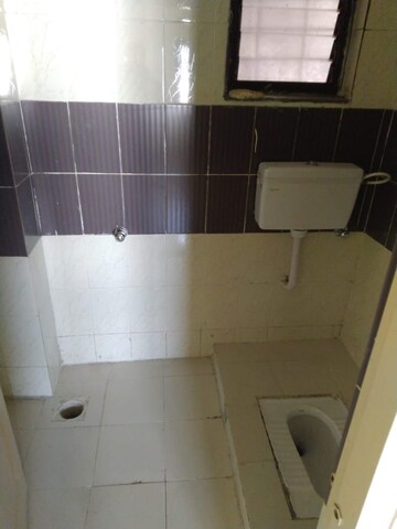 Bathroom in 2 BHK Apartment at Kala Nagar – for Sale