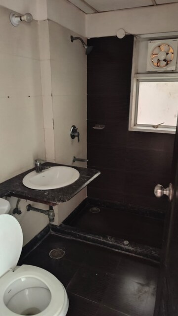 Bathroom in 3 BHK Apartment at Gulshan Ikebana, Sector 143 – for Sale