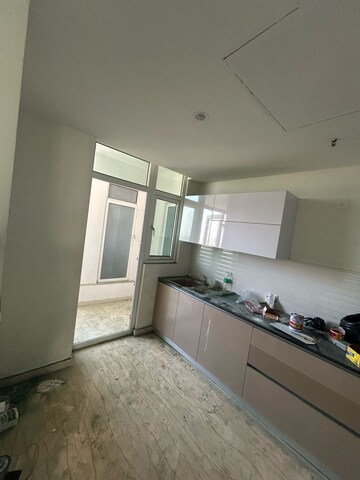 Kitchen in 3 BHK Apartment at Aims Golf Avenue I, Sector 75 – for Rent