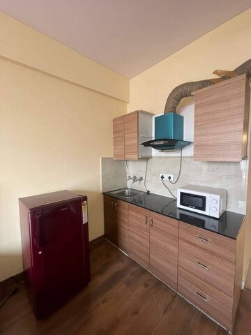Kitchen in Studio Apartment at Peach Jasmine Apartments, Sector 31 – for Rent