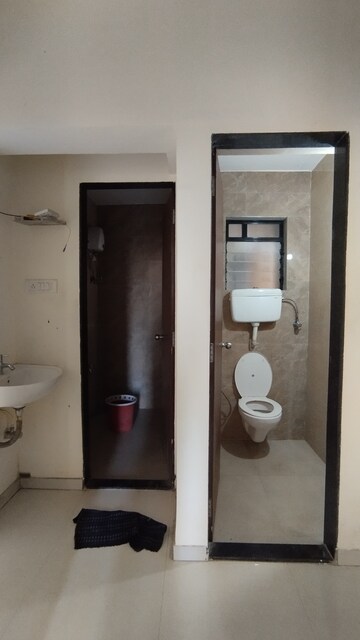 Bathroom in 1 BHK Apartment at Raunak City Sector 4 D2, Kalyan West – for Rent