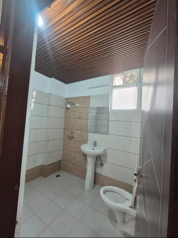 Bathroom in 2 BHK Apartment at Green Valley Heights, Dhakoli Village – for Sale