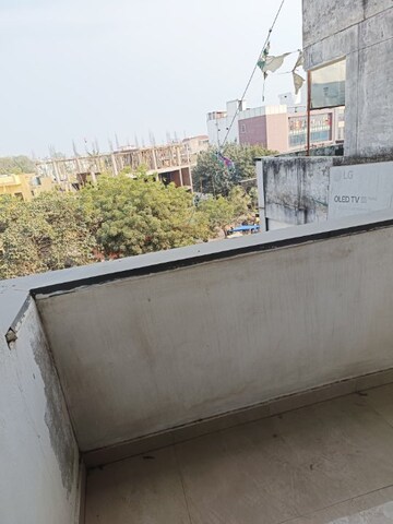Balcony in 2 BHK Apartment at Orchid Plaza, Vikas Nagar – for Rent
