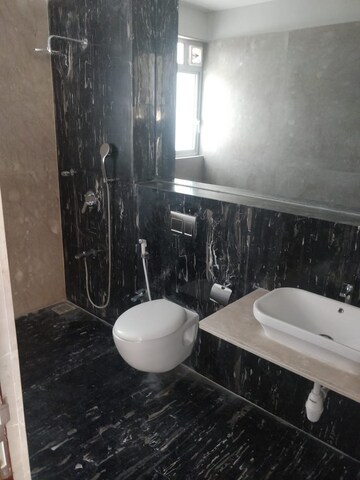 Bathroom in 3 BHK Apartment at Omkar Alta Monte, Malad East – for Rent