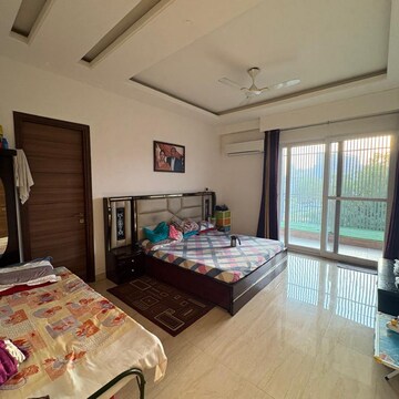 Bedroom in 4 BHK Apartment at Ansal API Esencia, Sector 67 – for Rent