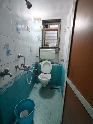 Bathroom in 1.5 BHK Apartment at Dudhsagar Apartment, Goregaon East – for Rent