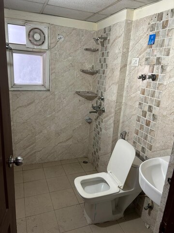 Bathroom in 3 BHK Apartment at Aims Golf Avenue I, Sector 75 – for Rent