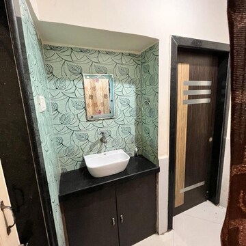 Bathroom in 2 BHK Apartment at Shraddha Evoque, Sonapur – for Rent