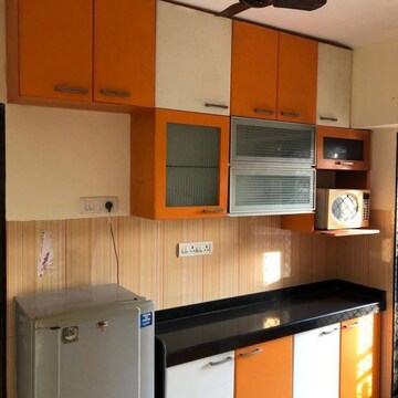 Kitchen in 2 BHK Apartment at Shraddha Evoque, Sonapur – for Rent
