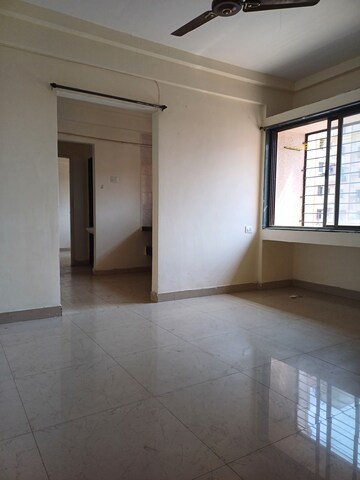Living Room in 1 BHK Apartment at Megh Malhar Co-op Housing Society, Ghansoli – for Rent