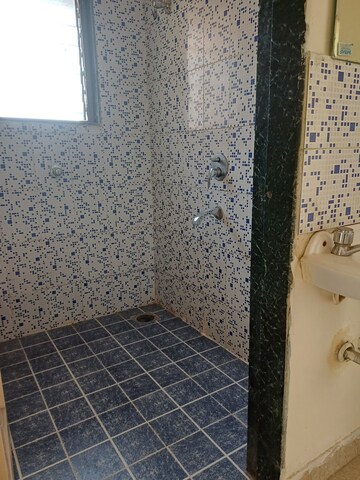 Bathroom in 1 BHK Apartment at Megh Malhar Co-op Housing Society, Ghansoli – for Rent