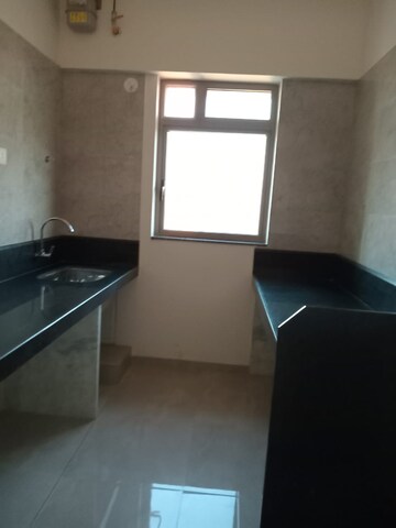 Kitchen in 1 BHK Apartment at Sheth Irene, Malad West – for Rent