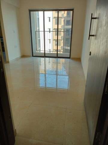 Living Room in 1 BHK Apartment at Sunteck Maxxworld, Naigaon East – for Rent
