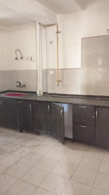 Kitchen in 3 BHK Apartment at Amrapali Silicon City, Sector 76 – for Rent