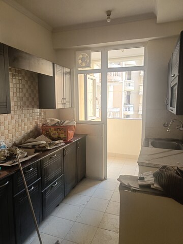 Kitchen in 3 BHK Apartment at Aims Golf Avenue I, Sector 75 – for Rent