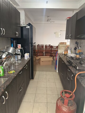 Kitchen in 3 BHK Apartment at Amrapali Silicon City, Sector 76 – for Rent