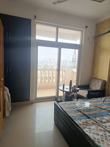 Bedroom in 3 BHK Apartment at Amrapali Silicon City, Sector 76 – for Rent