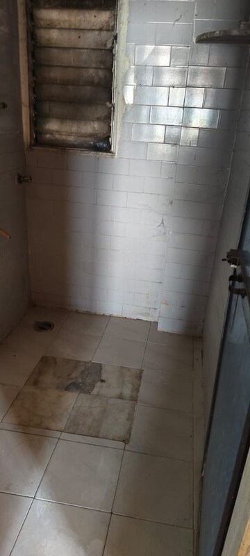Bathroom in 2 BHK Apartment at Gokul Village CHS, Mira Road East – for Sale