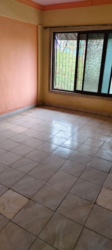 Room in 2 BHK Apartment at Gokul Village CHS, Mira Road East – for Sale