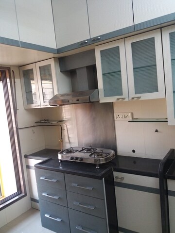 Kitchen in 2 BHK Apartment at Serenity CHS Ltd, Mira Road – for Rent