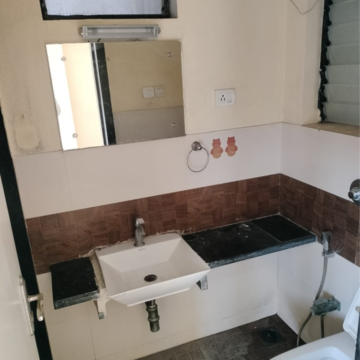 Team Area in 1 BHK Apartment at Lalani Valentine Apartment, Riddhi Gardens – for Rent