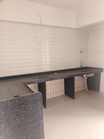 Kitchen in 2 BHK Apartment at P J Palm Prism, Shahad – for Sale