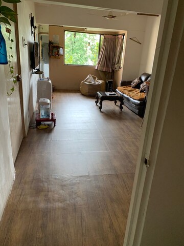 Living Room in 2 BHK Apartment at Sinchan CHS, Andheri West – for Rent