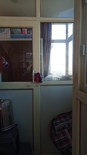 Kitchen in 2 BHK Apartment at Paradigm Business Hermitage Park, Dhakoli Village – for Sale
