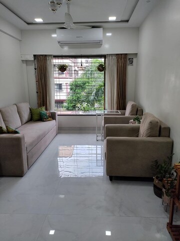 Living Room in 1 BHK Apartment at Dosti Oro 67, Kandivali West – for Rent