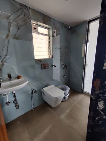 Bathroom in 2 BHK Apartment at Pramanik Walchand Paradise, Mira Road – for Rent