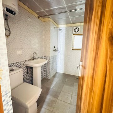 Bathroom in 3 BHK Apartment at Gardenia Golf City, Noida Central – for Rent