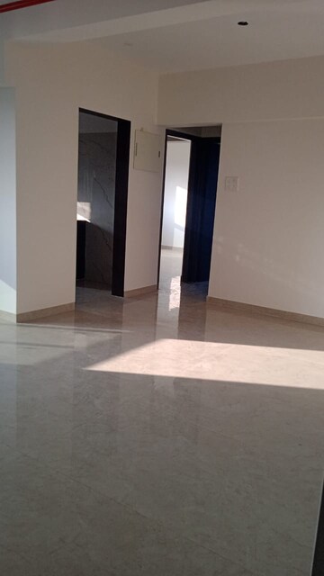 Living Room in 2 BHK Apartment at Siddha Seabrook, Kandivali West – for Sale